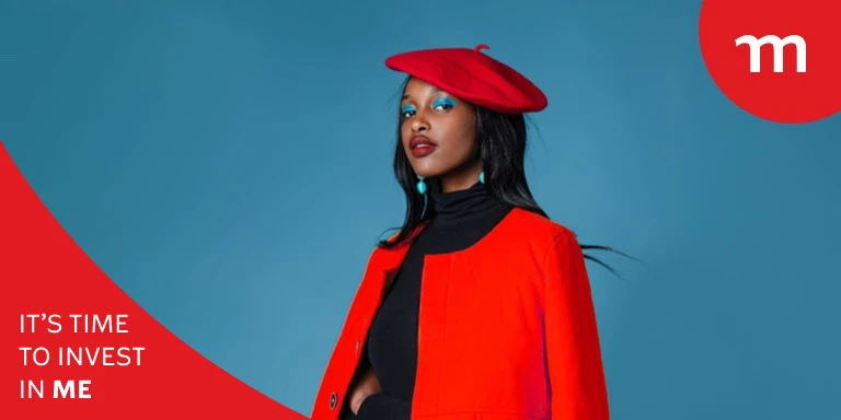 Portrait of a confident woman dressed in a bold red jacket and matching red beret over a black top against a solid blue background, representing a secure retirement savings plan