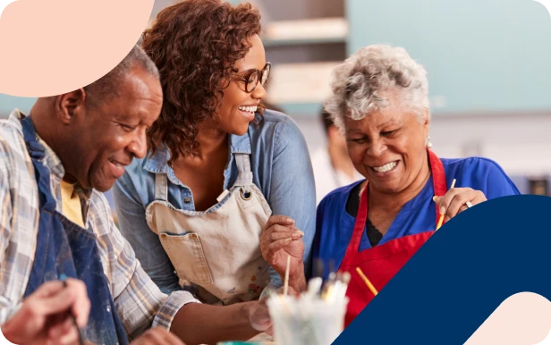 An African woman spending family time with her elderly parents, representing peace of mind that her Living Will will honour her end-of-life medical wishes in a way that reflects her values.