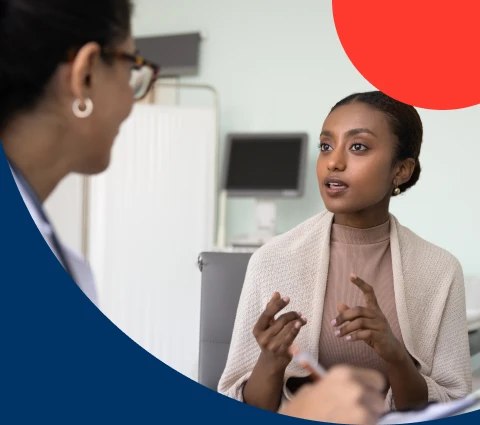 A young woman informing her doctor about a living Will she has in place in case something happens to her.