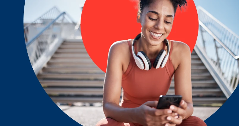 A woman completing her Momentum LifeReturns digital health and fitness assessment on her smartphone.