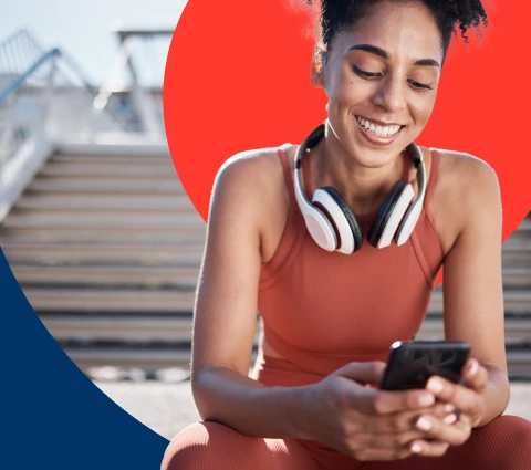 A woman completing her Momentum LifeReturns digital health and fitness assessment on her smartphone.