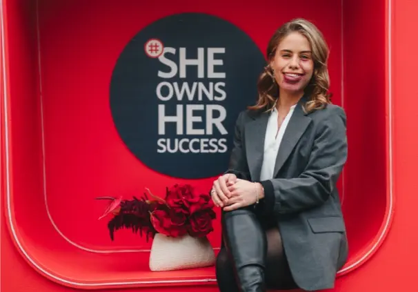 #SheOwnsHerSuccess branding, featuring an overlaid hero image of Natasha Joubert, Miss South Africa 2023, captured on set during the #SheOwnsHerSuccess Workshop.