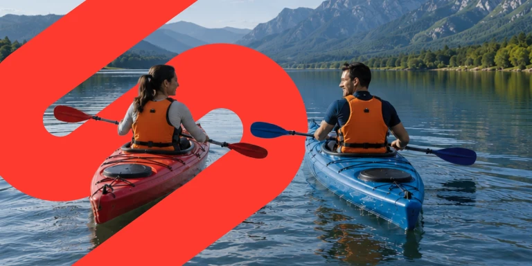 A couple kayaking on a calm lake toward scenic mountains, symbolising financial security and freedom that comes with long-term saving. 