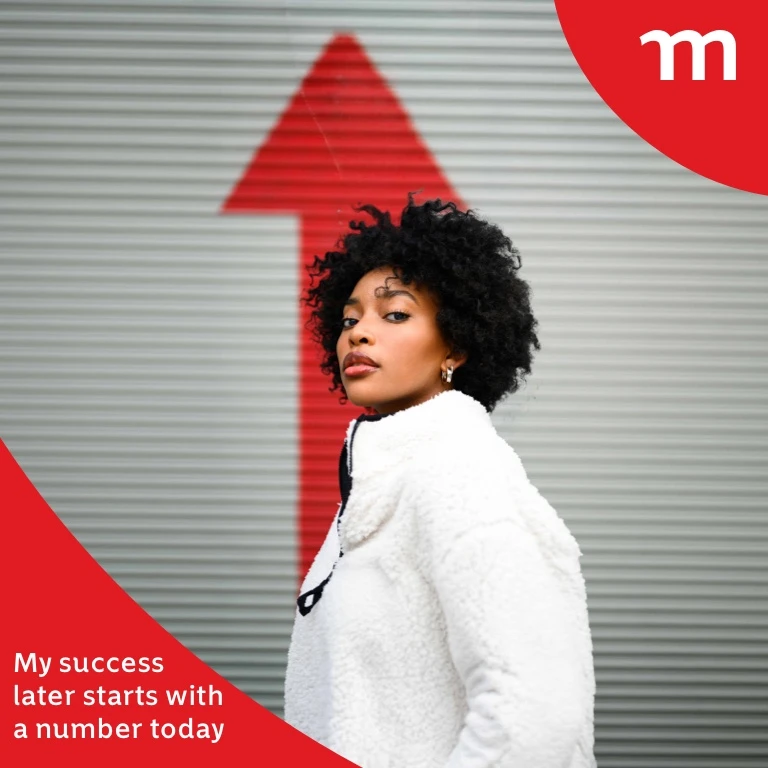 Young woman standing in front of a large red upward arrow symbolising compound interest and growth, representing smart retirement planning with a retirement annuity.