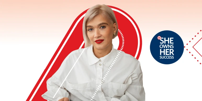 Confident white woman in her 30s, wearing a white shirt and red lipstick, smiles boldly embodying Momentum’s She Owns Her Success persona.